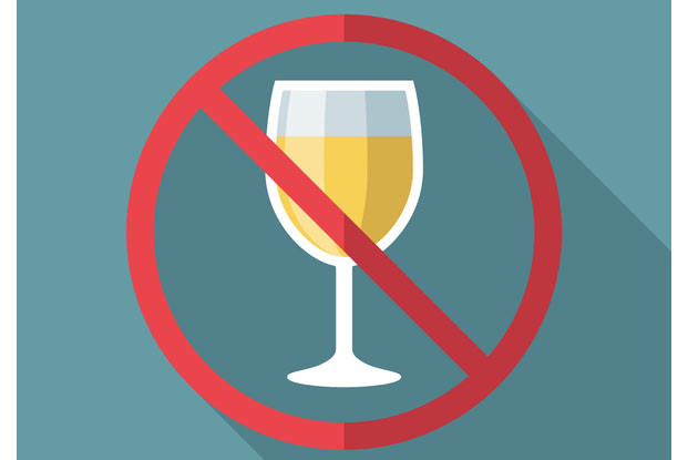 Graphic showing a full glass of alcohol, on top of it is a cross out sign
