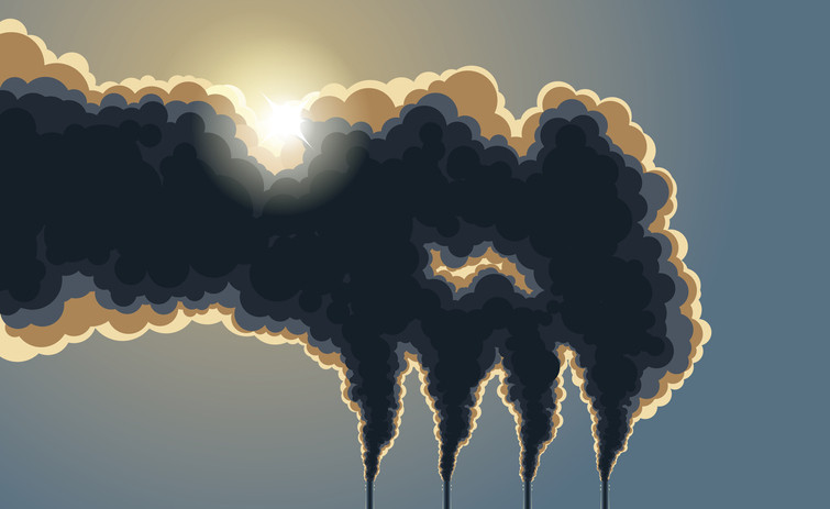 Thick smoke and air pollution streaming out of four industrial chimneys, forming dark, layered clouds that partly block the sun