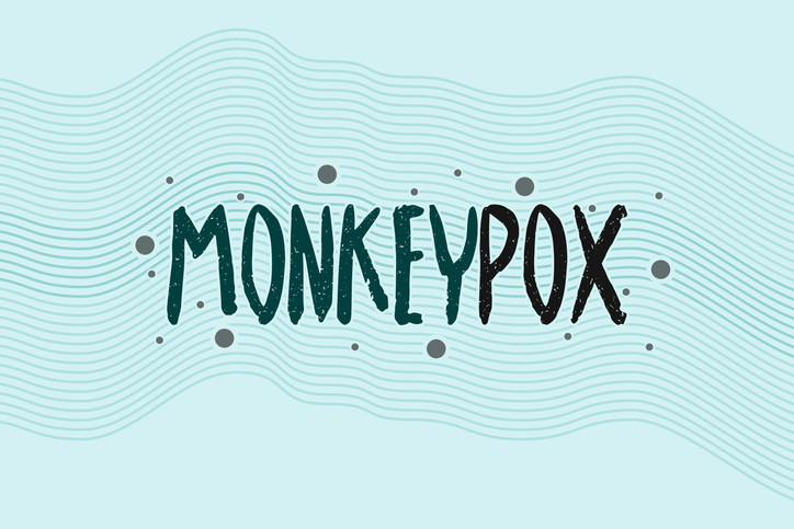 The word "Monkeypox" written in two colors against a light blue background with wavy blue lines and dots of different sizes