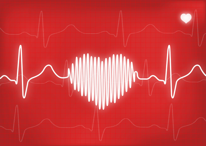 Light tracings from an electrocardiogram in the background against a red backdrop; heart rhythm tracings in thicker white lines forming into a heart shape in the middle