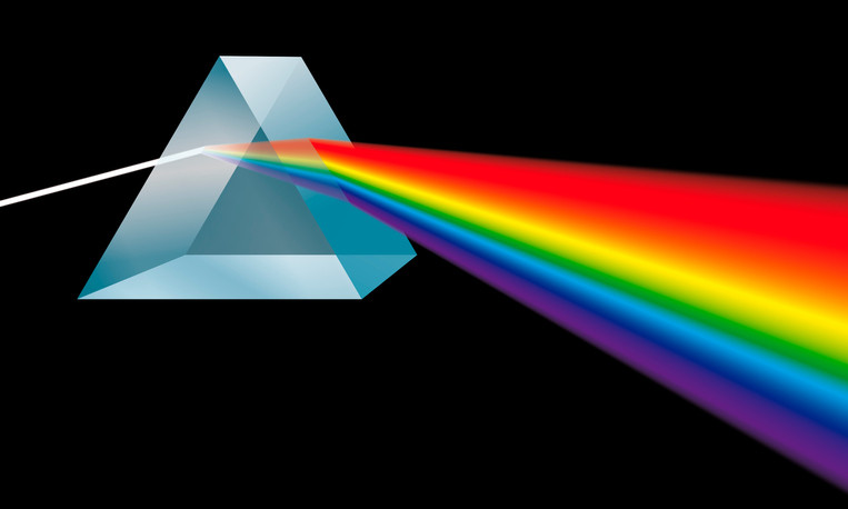 A graphic of light being reflected off of a glass prism, projecting a rainbow