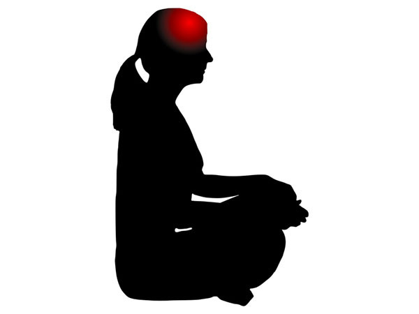 A graphic of a woman meditating, sitting cross-legged, from the right-side view. The woman is depicted in black but there's a red dot on the woman's forehead, indicating pain