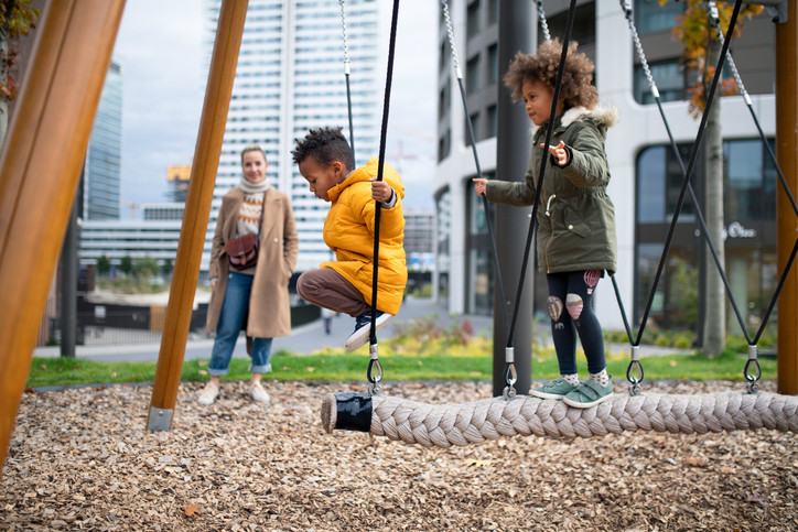 kids playing outside on playground