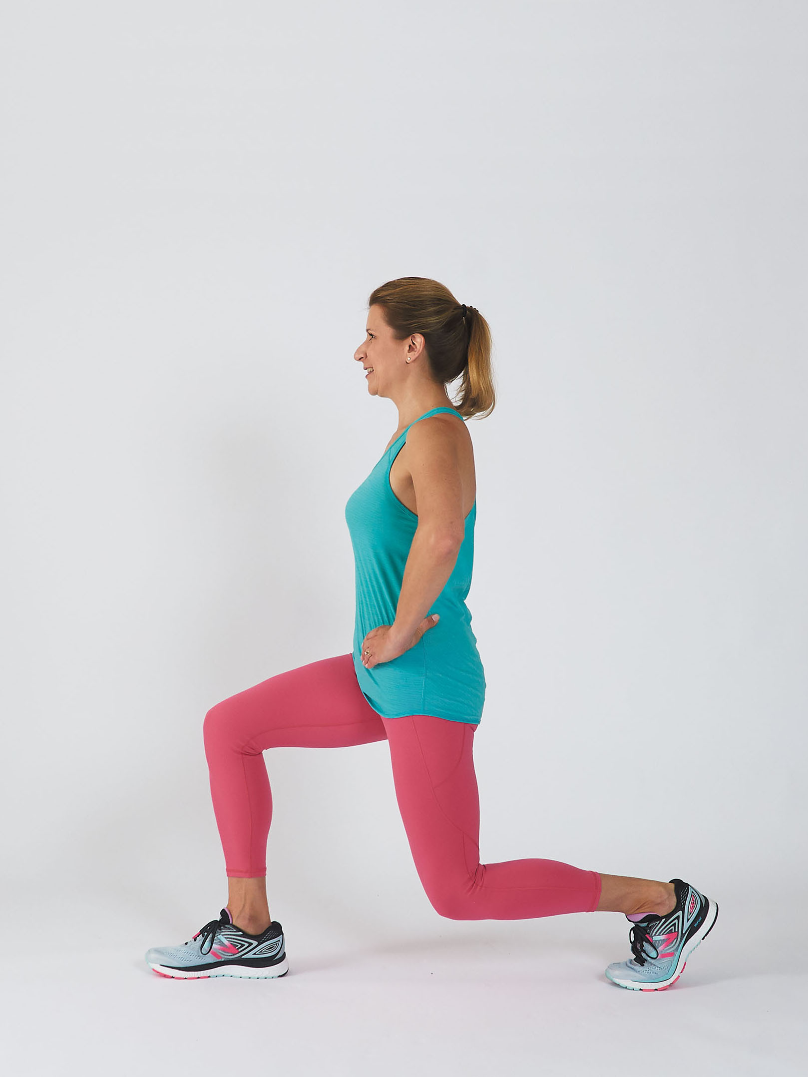 photo of a person performing the stationary lunge exercise, showing the movement