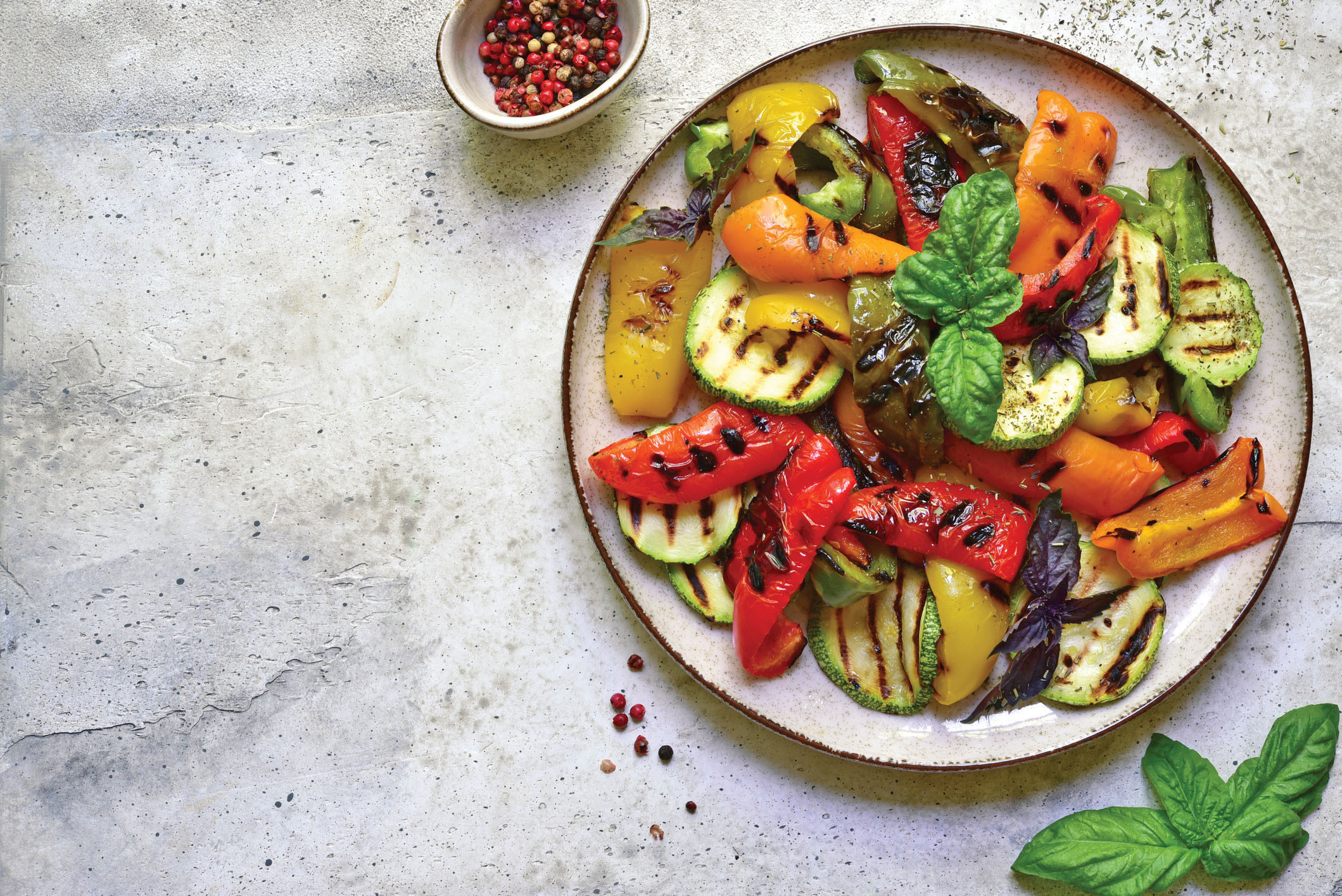 close-up photo of colorful grilled vegetables on a plate