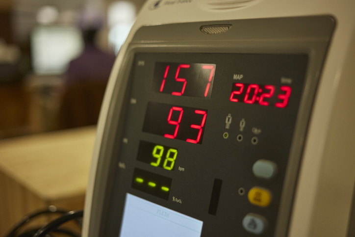 A photo of a medical digital blood pressure monitor screen.