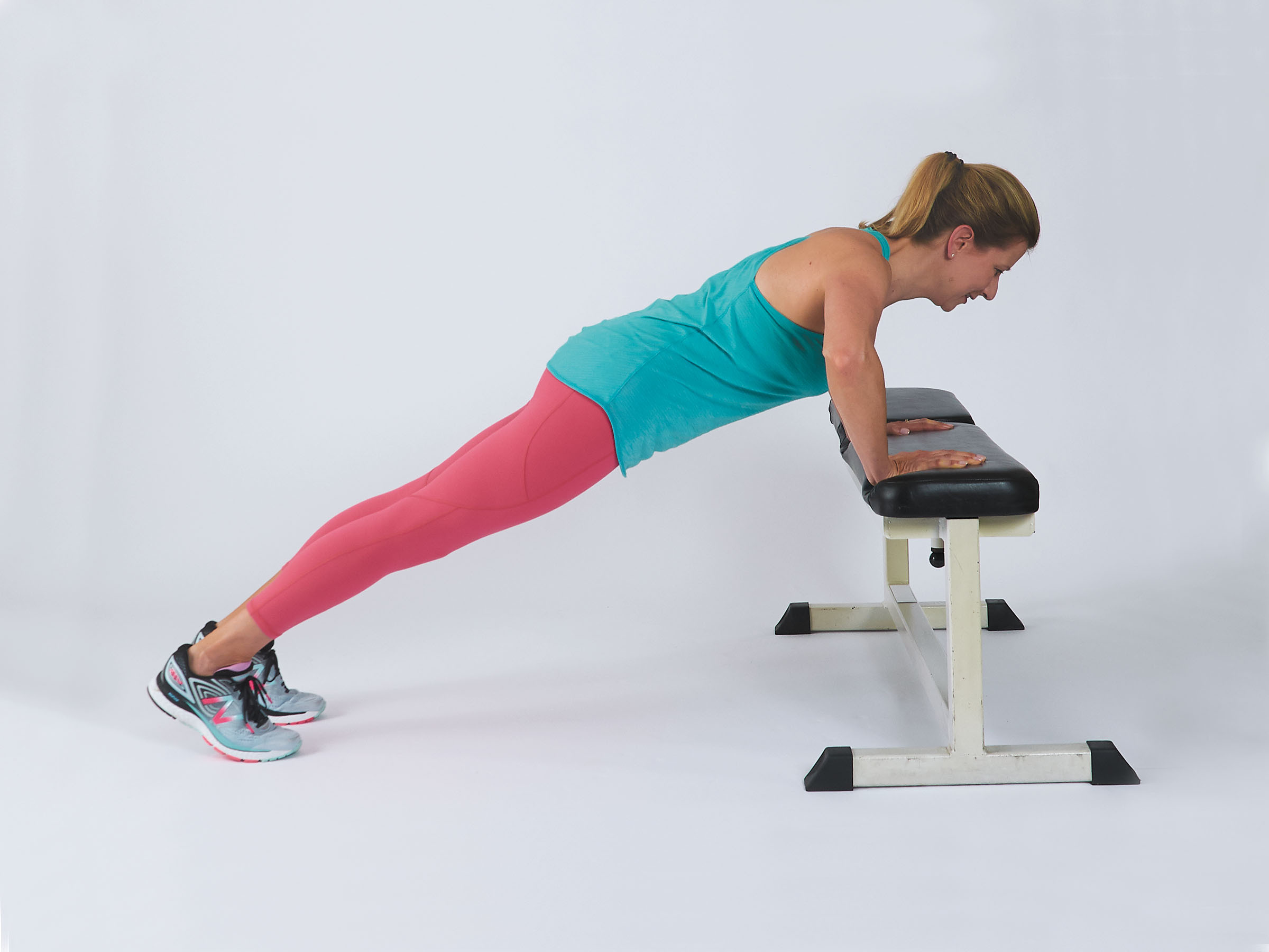 photo of the bench push-up exercise showing the movement as described in the text