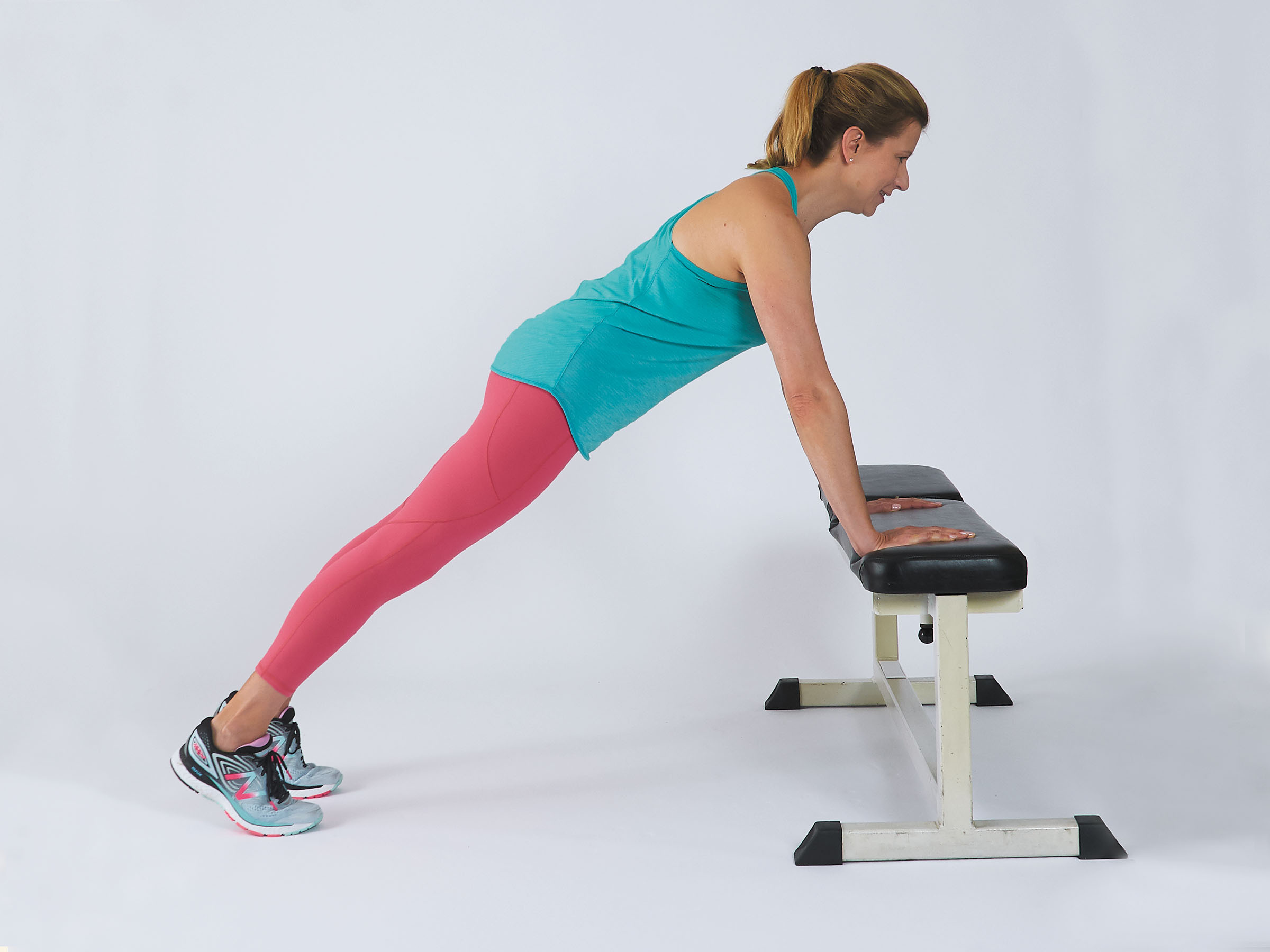 photo of the bench push-up exercise showing the starting position as described in the text