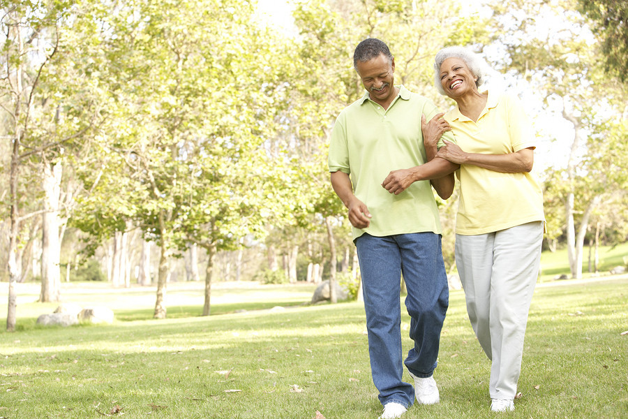 Man and woman walking arm in arm