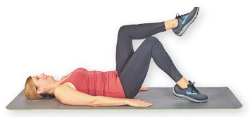 photo of a woman demonstrating the movement for the alternating toe taps exercise as described in the article