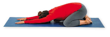 photo of a woman in the yoga child's pose as described in the article text
