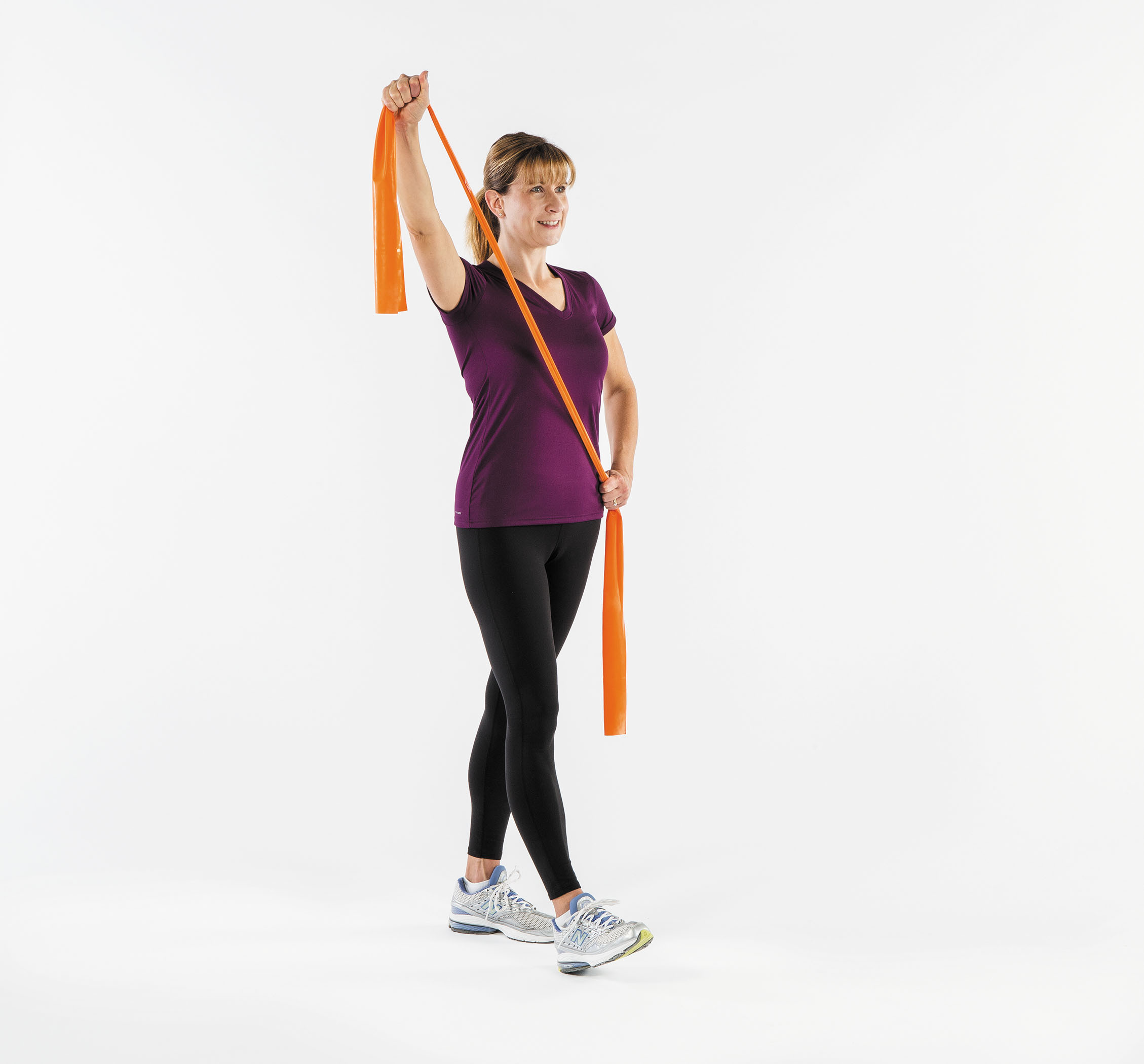 photo of a woman performing step two of the sword pull exercise