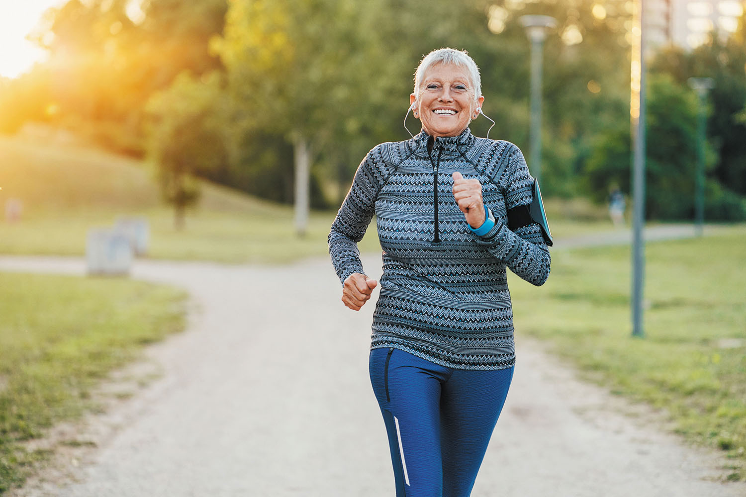 photo of a senior woman jogging in a park
