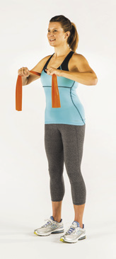Image of a woman holding an orange rubber band in the starting position for a chest compression exercise as described in the article.