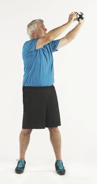 photo of a man performing the wood chop exercise as described in the article