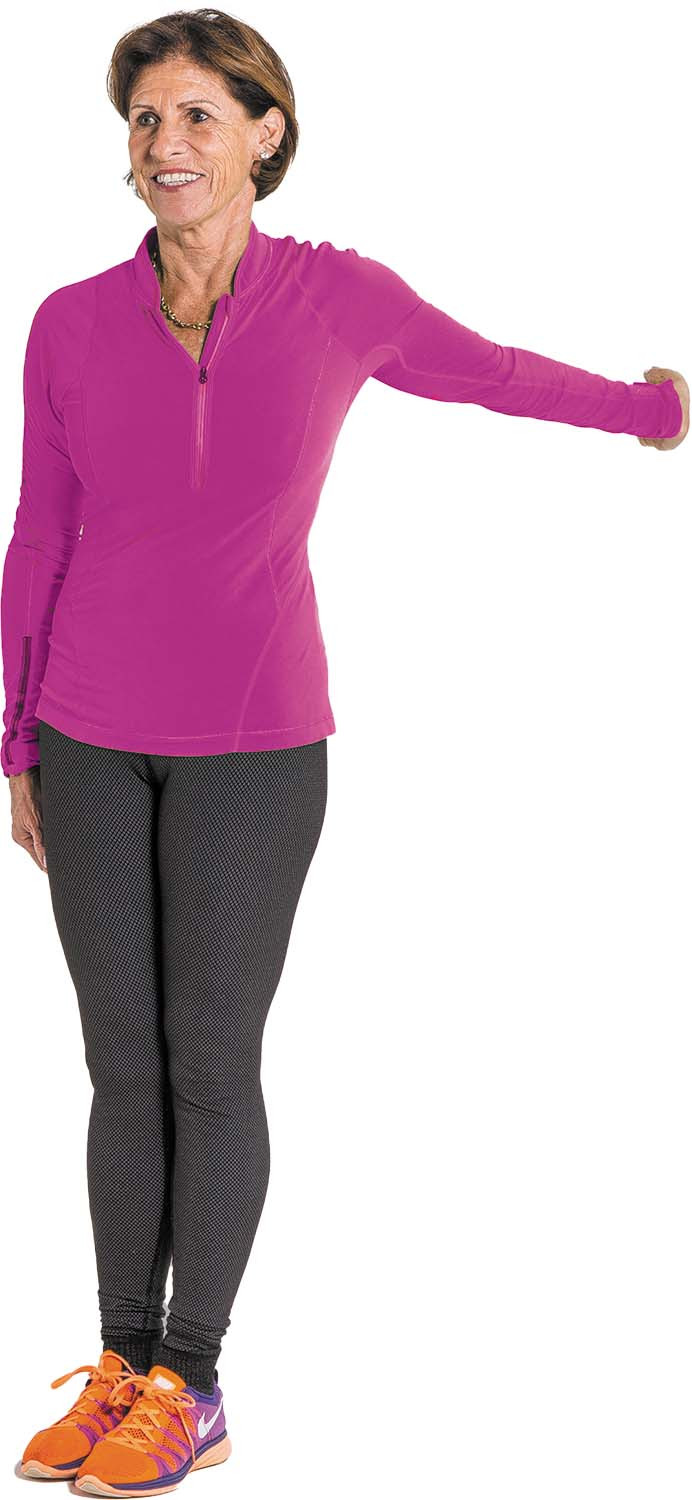 photo of a woman doing the standing chest and shoulder stretch as described in the article